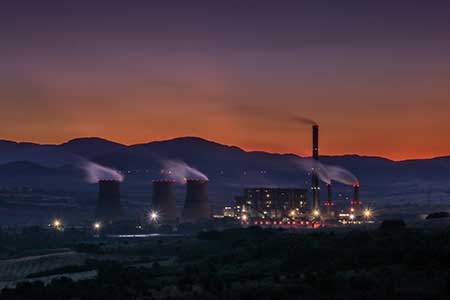 alt=nuclear_plant_at_sunset